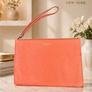 kate spade Coral Pebbled Leather Wristlet with Gold Logo